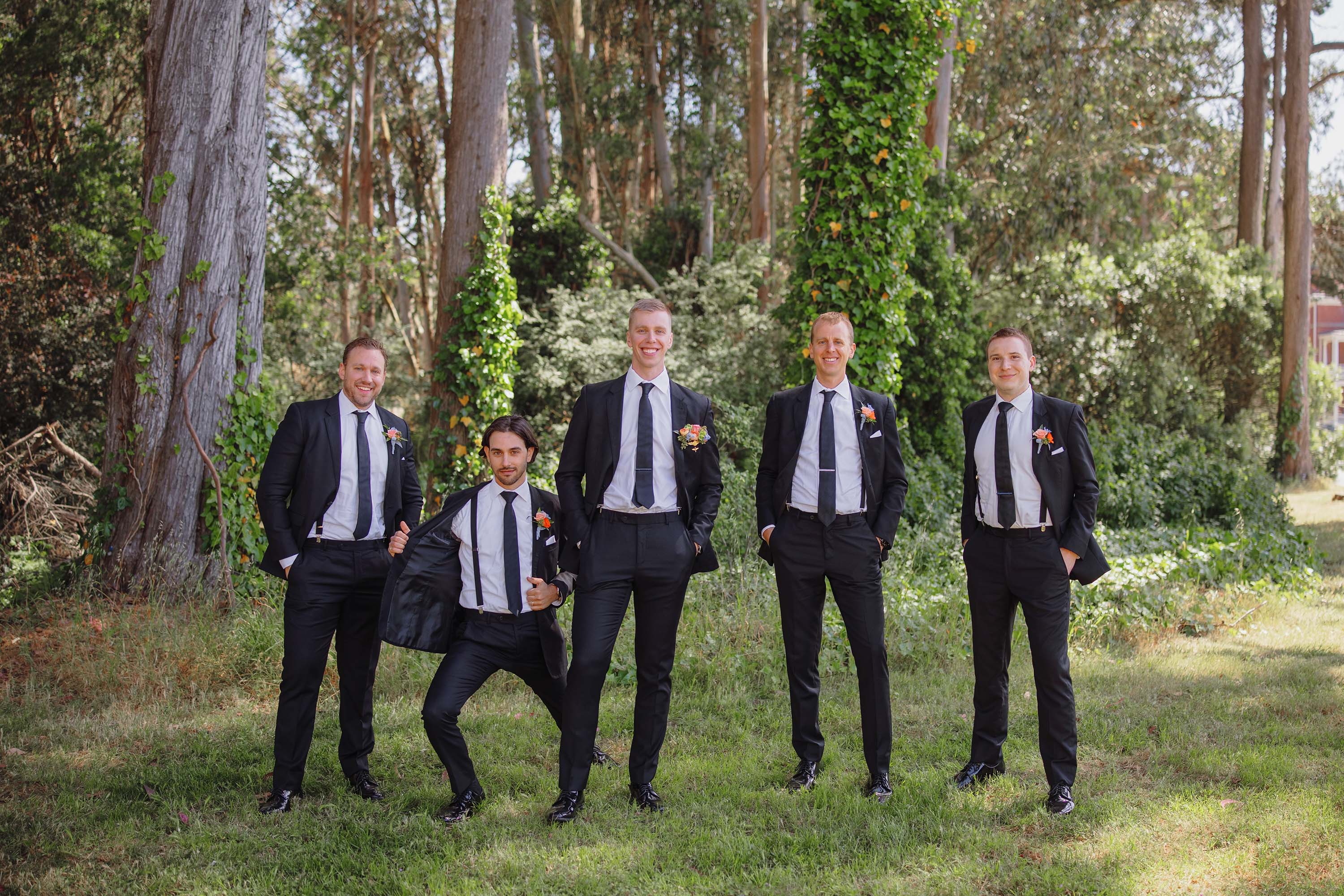 portrait of groom with his groomsmen